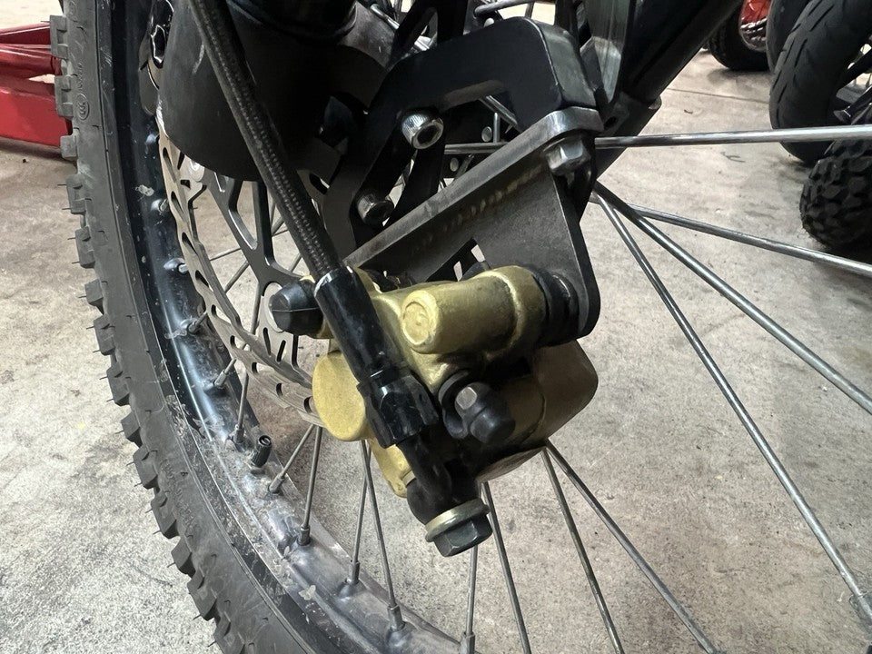 Surron LBX Light Bee Front or Rear Brake Caliper Relocation Bracket with Caliper