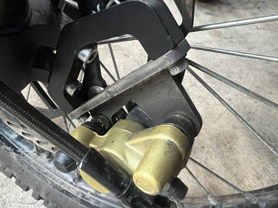 Surron LBX Light Bee Front or Rear Brake Caliper Relocation Bracket with Caliper