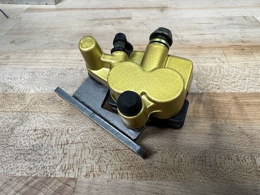 Surron LBX Light Bee Front or Rear Brake Caliper Relocation Bracket with Caliper